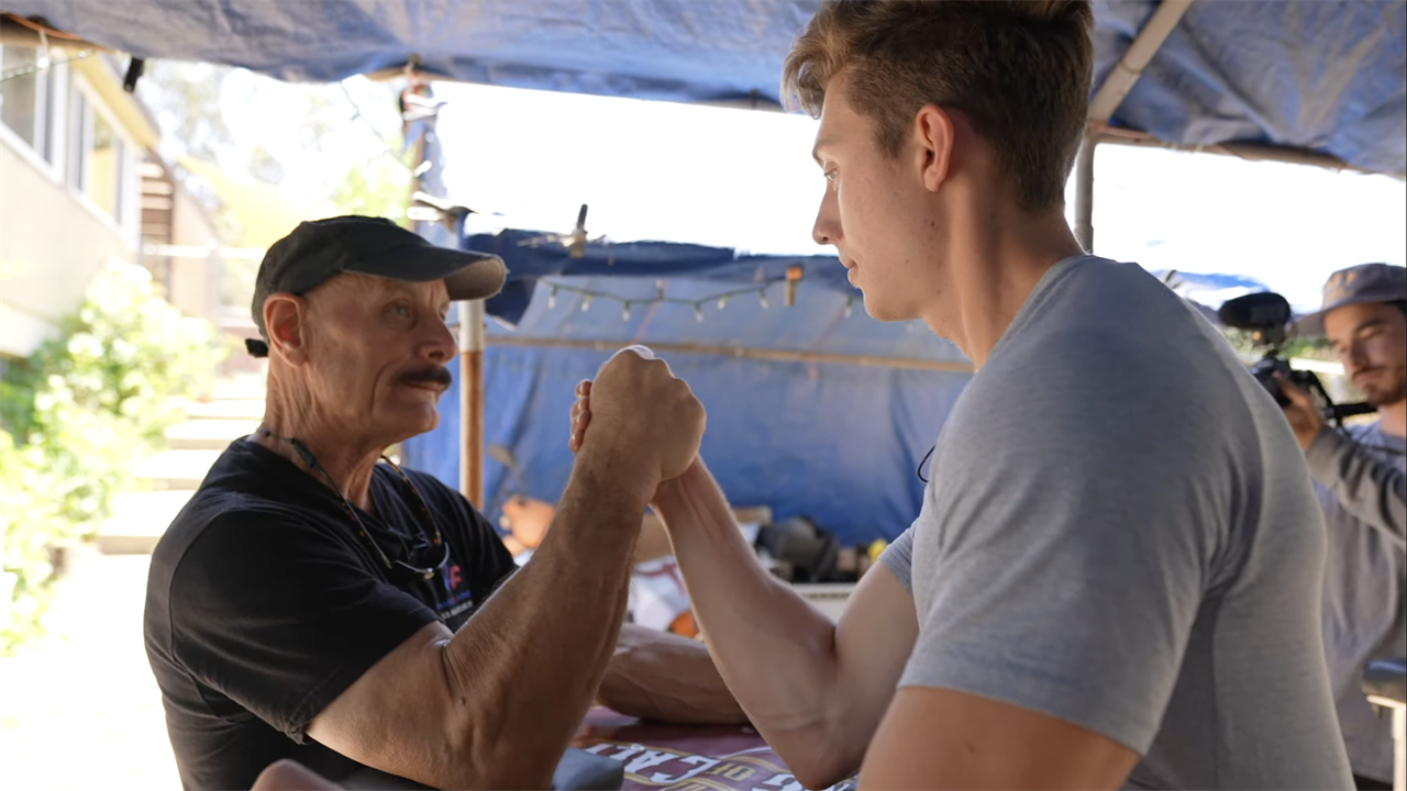 A Fitness YouTuber Trained With an Arm Wrestling Champion for a Day
